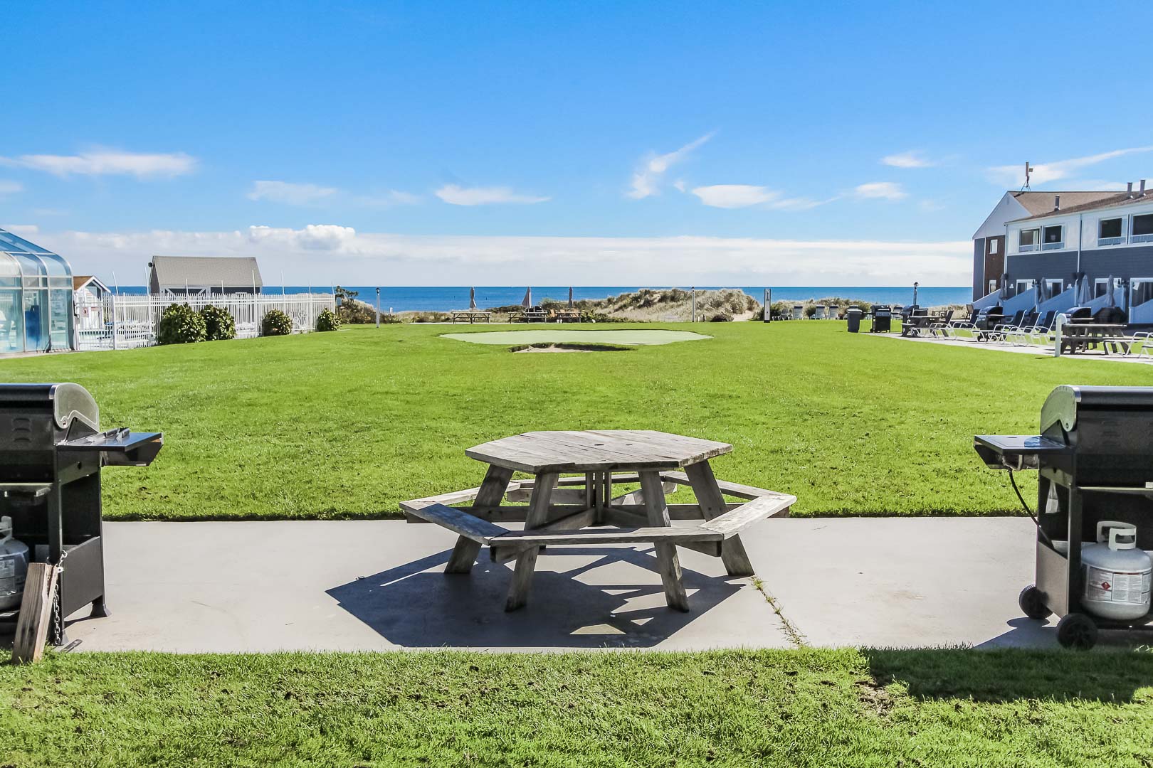 A relaxing patio deck overseeing the ocean at VRI's Edgewater Beach Resort in Massachusetts.